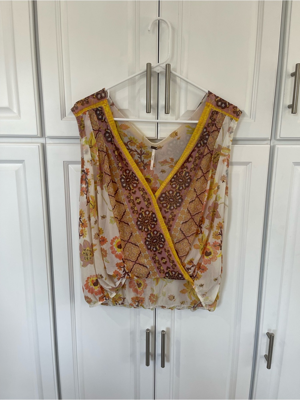 Free People small yellow cream high low style top